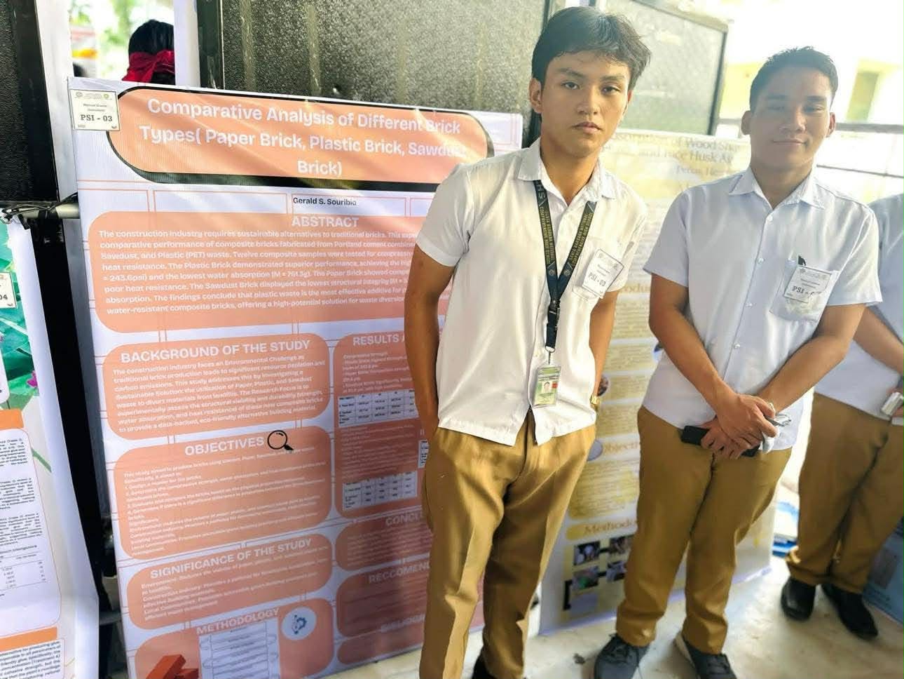 Student researchers presenting their project with an adviser