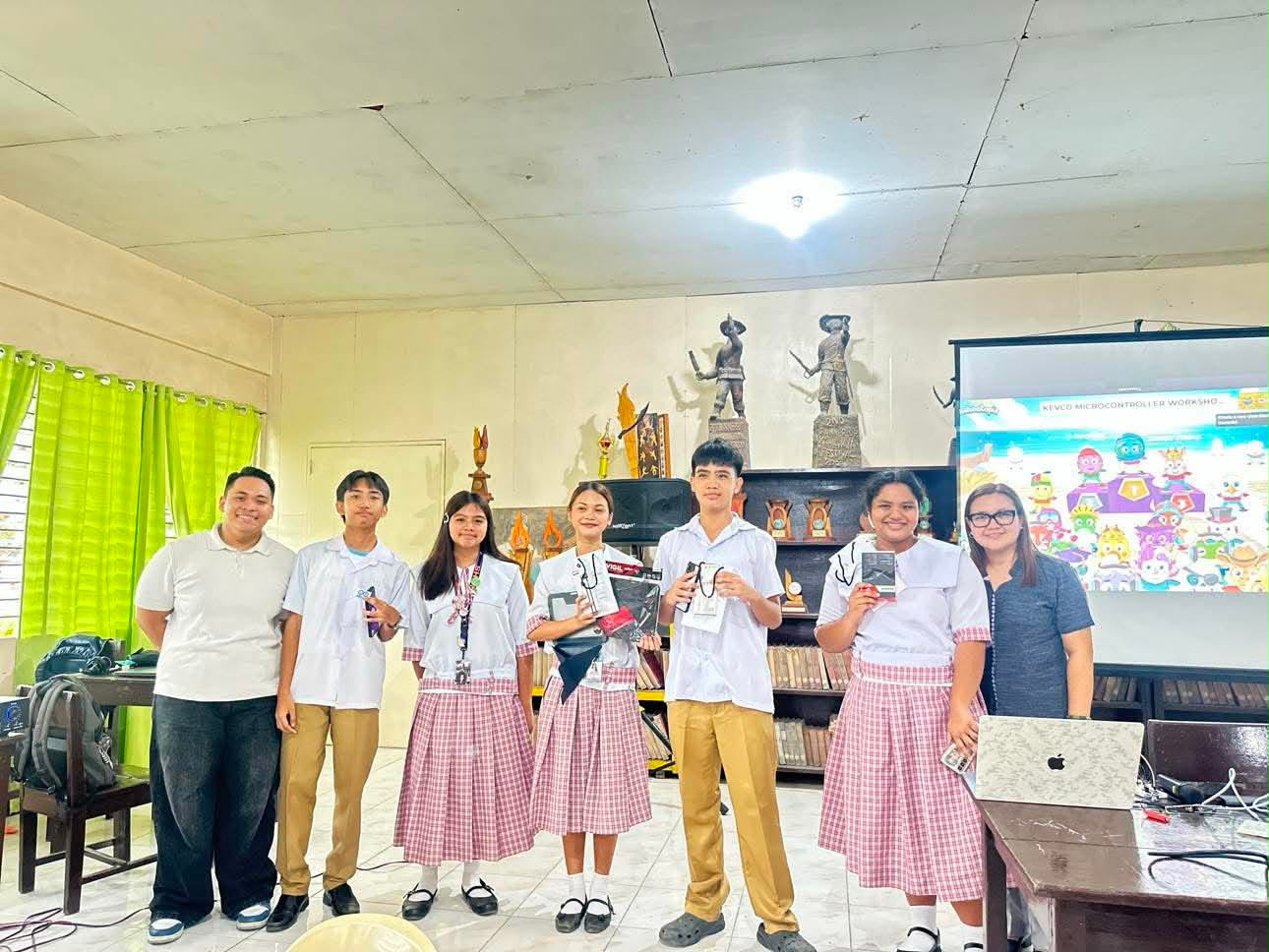 Students and teachers receiving recognition during an STE activity